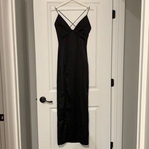 Beautiful black cross back slip dress with side slip that goes up to thigh